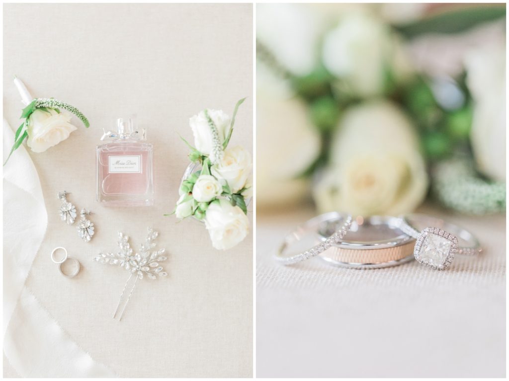 Wedding flatlay with perfume, rings and flowers
