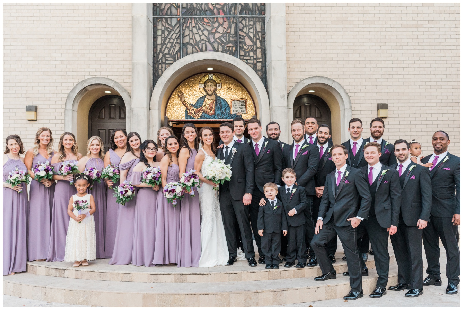 Bridesmaids in dusty lavender chiffon dresses