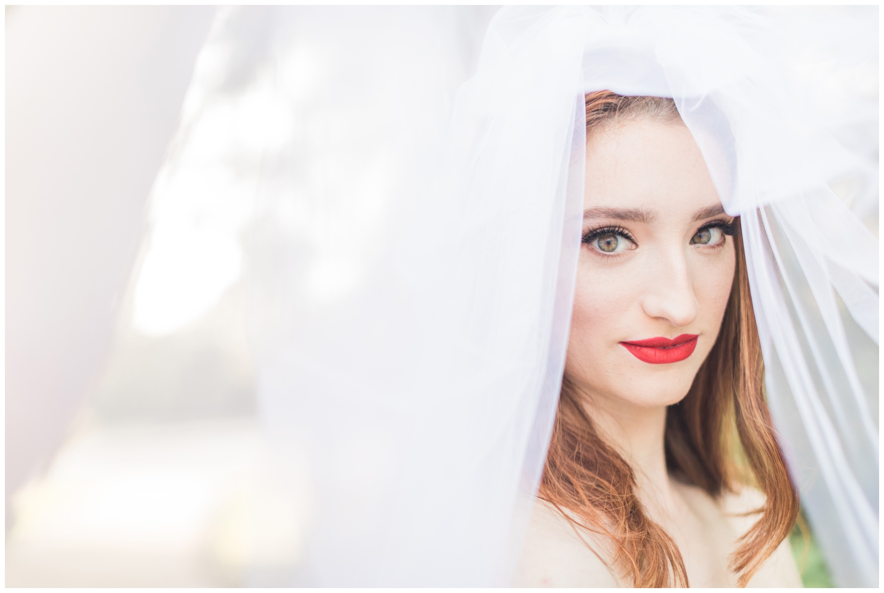 Bride with Hollywood inspired makeup and red lips