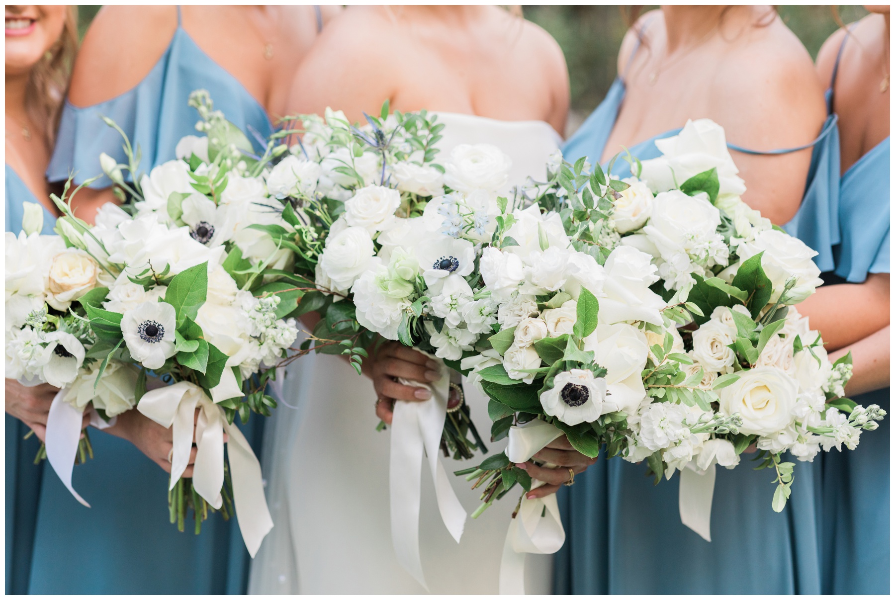 All white wedding bouquets with anemonies