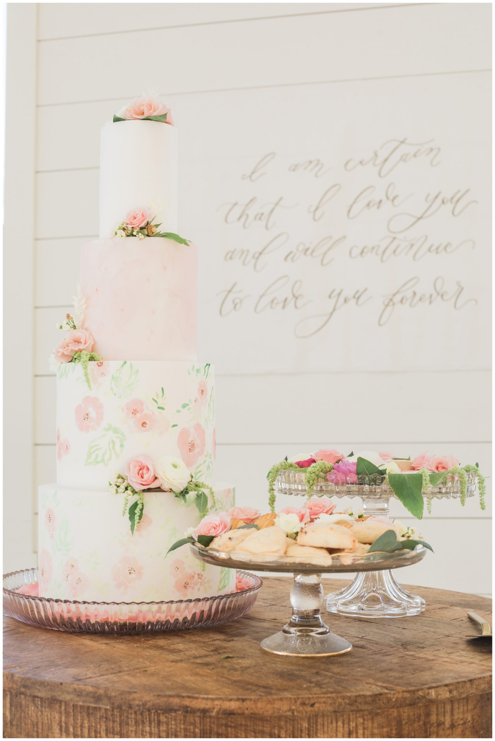 Hand painted floral wedding cake by Sinfully Sweet