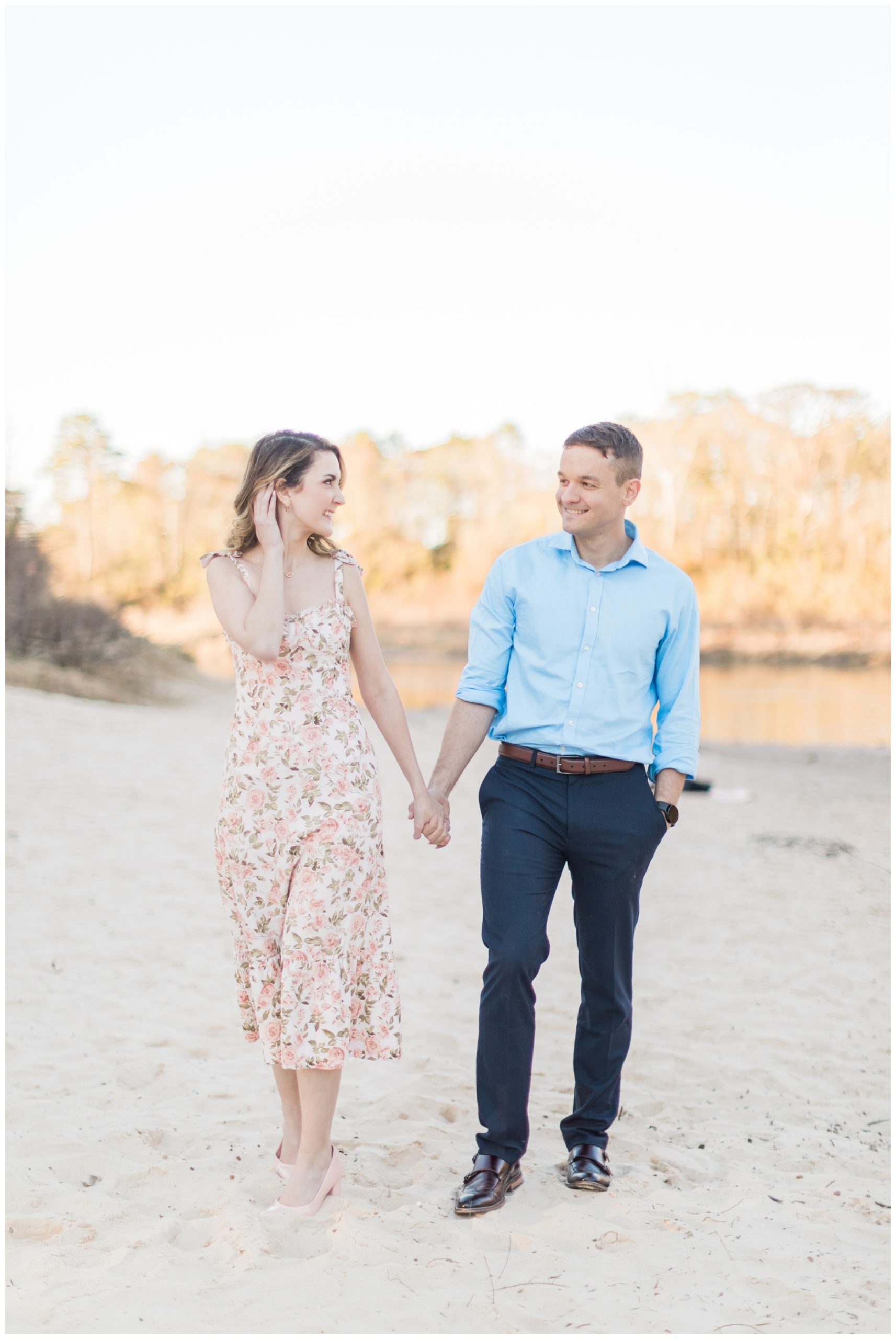 Bride in a floral dress for a creekside engagement session
