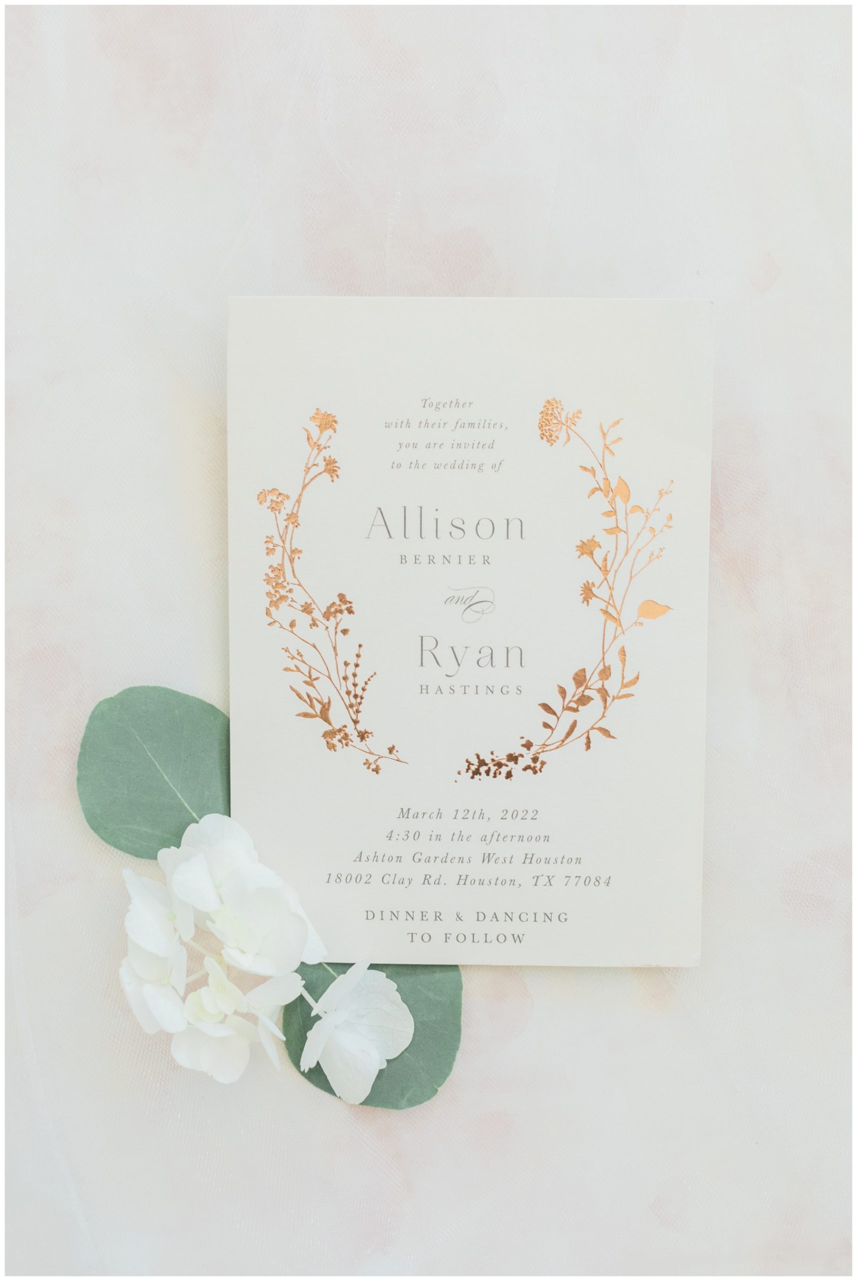 White and gold stationery for a wedding at Ashton Gardens West
