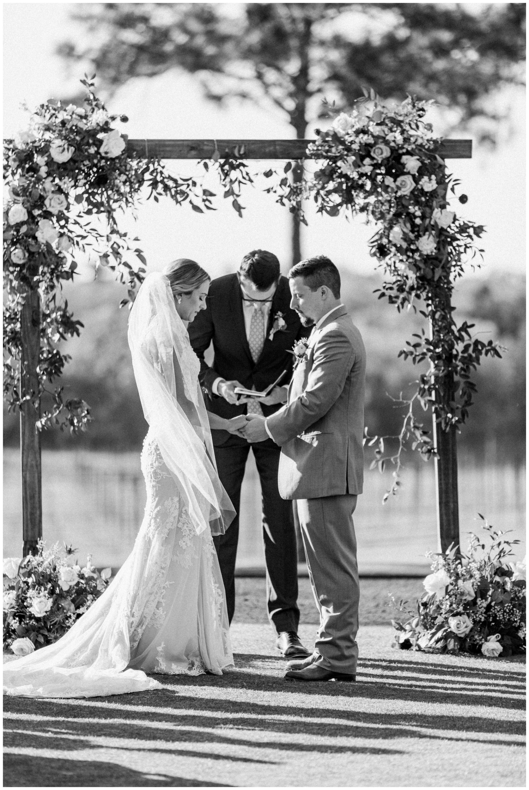 Outdoor wedding ceremony at The Vine on the banks of Brunwine Lake